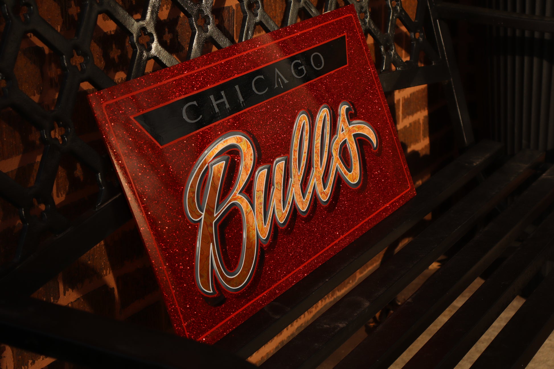 Chicago Bulls logo on a red flake background 